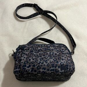 VGUC Lug scoop crossbody bag, leopard navy. 10”W x 7”H x 3.5”D.